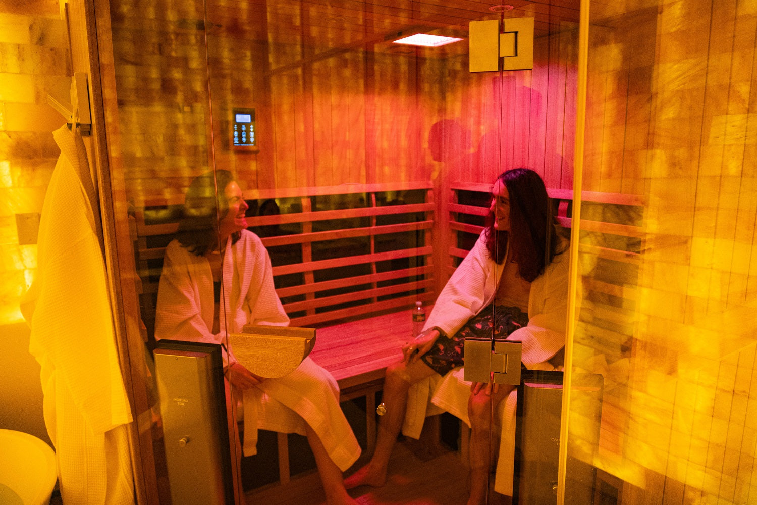 Friends enjoying the breathing rooms infrared sauna